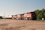 Santa Fe C40-8W #880 leads a J. B. Hunt intermodal train eastbound 